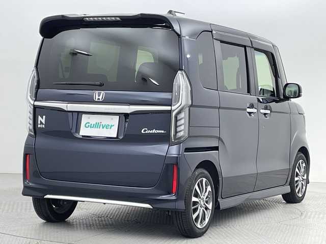 ホンダ Ｎ ＢＯＸ カスタム L 新潟県 2022(令4)年 2.7万km ミッドナイトブルービームM ホンダセンシング/シーケンシャルウィンカー/純正ナビ/　CD/DVD/Bluetooth/フルセグTV/バックカメラ/左側パワースライドドア/レーダークルーズコントロール/LEDオートライト/シートヒーター/純正14インチアルミホイール/ウィンカーミラー/電格ミラー/ステアリングリモコン/レーンキープアシスト/スマートキー/ビルトインETC