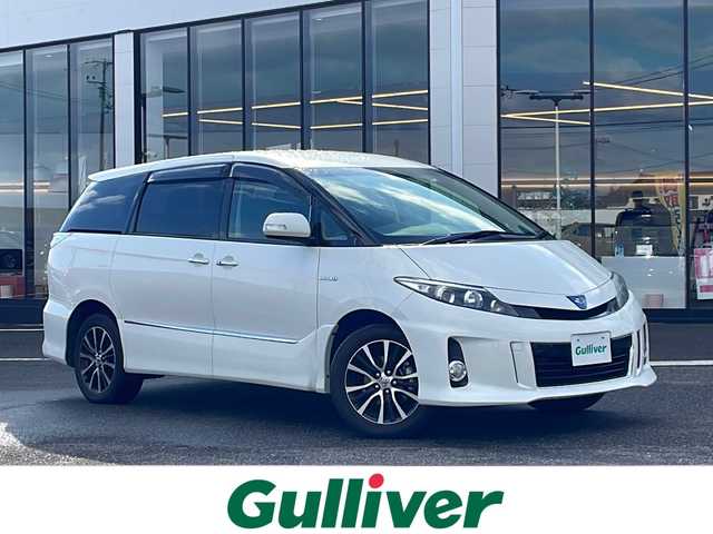 トヨタ エスティマ ハイブリッド アエラス プレミアムエディション 新潟県 2013(平25)年 9.3万km ホワイトパールクリスタルシャイン 純正メモリナビ/(AM/FM/Bluetooth/CD/DVD)/フルセグTV/バックカメラ/両側パワースライドドア/パワーシート(運転席)/アダプティブクルーズコントロール/オットマン/パワーバックドア/ETC/純正AW付サマータイヤ