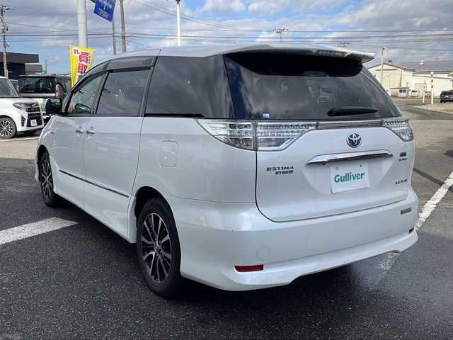 トヨタ エスティマ ハイブリッド アエラス プレミアムエディション 新潟県 2013(平25)年 9.3万km ホワイトパールクリスタルシャイン 純正メモリナビ/(AM/FM/Bluetooth/CD/DVD)/フルセグTV/バックカメラ/両側パワースライドドア/パワーシート(運転席)/アダプティブクルーズコントロール/オットマン/パワーバックドア/ETC/純正AW付サマータイヤ