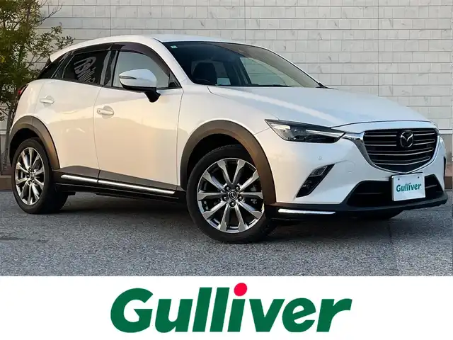マツダ ＣＸ－３ 20S エクスクルーシブモッズ 滋賀県 2018(平30)年 4.4万km スノーフレイクホワイトパールマイカ 純正HDDナビ/(AM/FM/CD/DVD/フルセグ/Bluetooth/AUX)/バックカメラ/ビルトインETC/踏み間違い防止アシスト/ブレーキアシスト/プリクラッシュブレーキアシスト/ヒルスタート（坂道発進）アシスト/前方衝突防止支援システム/後側方衝突防止支援システム/TCS（トラクションコントロールシステム）/VDC（ビークルダイナミクスコントロール）/レーンキープアシスト/車間自動制御システム	/ASCD（オートスピードコントロール装置）/ABS（アンチロックブレーキシステム）/バックビューモニター/コーナー・バックセンサー（ソナー）/標識検知機能/運転席・助手席シートヒーター/電動格納ミラー/電子パーキング/ブレーキホールド/ステアリングスイッチ/ステアリングヒーター/パドルシフト/オートライト/オートハイビーム/LEDヘッドライト/フロントフォグ/フルオートエアコン/USB端子/プッシュスタート/スマートキー/純正フロアマット