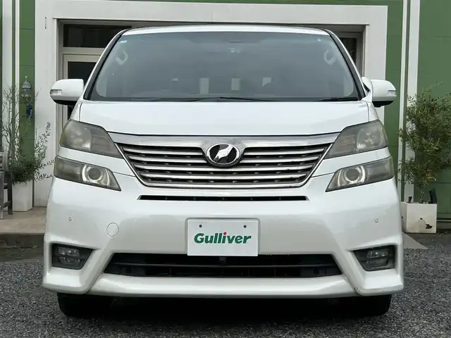 トヨタ ヴェルファイア 2．4Z プラチナセレクションⅡ 埼玉県 2010(平22)年 11.9万km ホワイトパールクリスタルシャイン Wサンルーフ/純正ナビTV/社外フリップダウンモニター/バックカメラ/両側パワースライドドア/パワーバックドア/ビルトインETC/前後ドライブレコーダー/横滑防止装置/クリアランスソナー/純正アルミホイール/二列目オットマン/プッシュスタート/オートライト/HID ヘッドライト/取扱説明書