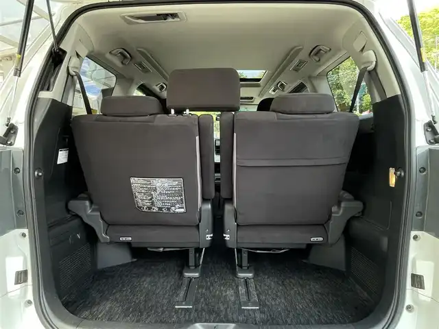トヨタ ヴェルファイア 2．4Z プラチナセレクションⅡ 埼玉県 2010(平22)年 11.9万km ホワイトパールクリスタルシャイン Wサンルーフ/純正ナビTV/社外フリップダウンモニター/バックカメラ/両側パワースライドドア/パワーバックドア/ビルトインETC/前後ドライブレコーダー/横滑防止装置/クリアランスソナー/純正アルミホイール/二列目オットマン/プッシュスタート/オートライト/HID ヘッドライト/取扱説明書