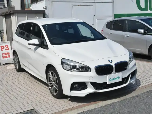 ＢＭＷ ２２０ｉ グランツアラー Mスポーツ 神奈川県 2016(平28)年 5.7万km アルピンホワイトⅢ 2.0ターボ/純正HDDナビ/(DVD/Bluetooth/USB/MSV)/バックカメラ/パワーバックドア/ドライビングアシスト/オートエアコン/ハニカムメッシュフロントエアロバンパー/LEDヘッドライト/スマートキー/前後ドライブレコーダー/ETC/横滑り防止機能/純正18インチアルミホイール/カーテンエアバック/スペアキー/保証書/取扱説明書