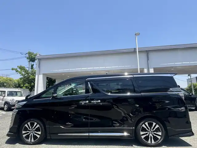 トヨタ ヴェルファイア Z Gエディション 熊本県 2018(平30)年 7.1万km ブラック ワンオーナー/モデリスタフルエアロ/モデリスタマフラー/モデリスタミラーガーニッシュ/モデリスタバックドアガーニッシュ/純正ディーラーナビ(NSZT-Y66T)/【フルセグTV/CD/DVD/Bluetooth】/バックカメラ/純正フリップダウンモニター(V12T-R66C)/両側パワースライドドア/衝突被害軽減システム/レーンキープアシスト/レーダークルーズコントロール/コーナーセンサー/合皮シート/前席パワーシート（D席メモリ付き）/前席シートヒーター/前席エアーシート/２列目オットマン/ハンドルヒーター/パワーバックドア/純正18インチアルミホイル/オートLEDライト/オートマチックハイビーム/ビルトインETC/純正フロアマット/横滑り防止装置/盗難防止装置/取扱説明書/保証書