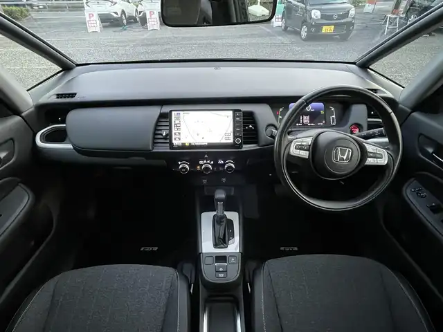 ホンダ フィット e:HEVホーム 埼玉県 2020(令2)年 2.2万km プレミアムグラマラスブロンズP 純正ナビTV/バックカメラ/前後ドラレコ/ETC/クリアランスソナー/オールシーズンタイヤ/プッシュスタート/スマートキー/走行２１１５３キロ/保証書付整備手帳/取扱説明書