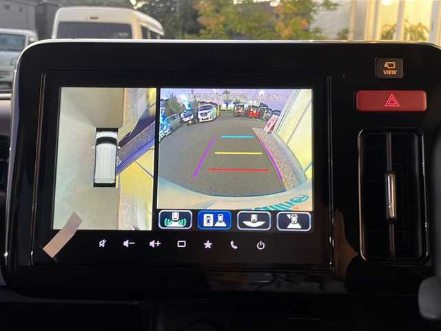 スズキ スペーシア カスタム HYBRID XS 福岡県 2025(令7)年 0.1万km ピュアホワイトP 純正9インチナビ/　（AppleCarPlay/FM/AM/フルセグ/Bluetooth)/全方位カメラ/HUD/ステアリングヒーター/ヘッドライトレベライザー/両側パワースライドドア/レーダークルーズコントロール/革巻きステアリング/ディーラーOPフロアマット/ディーラーOPドアハンドルプロテクター/シートヒーター/横滑り防止装置/コーナーセンサー/レーンキープアシスト/衝突軽減システム/オートライト/LEDライト/純正ホイール/電格ミラー