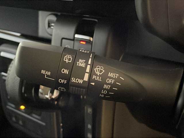 スズキ スペーシア カスタム HYBRID XS 福岡県 2025(令7)年 0.1万km ピュアホワイトP 純正9インチナビ/　（AppleCarPlay/FM/AM/フルセグ/Bluetooth)/全方位カメラ/HUD/ステアリングヒーター/ヘッドライトレベライザー/両側パワースライドドア/レーダークルーズコントロール/革巻きステアリング/ディーラーOPフロアマット/ディーラーOPドアハンドルプロテクター/シートヒーター/横滑り防止装置/コーナーセンサー/レーンキープアシスト/衝突軽減システム/オートライト/LEDライト/純正ホイール/電格ミラー