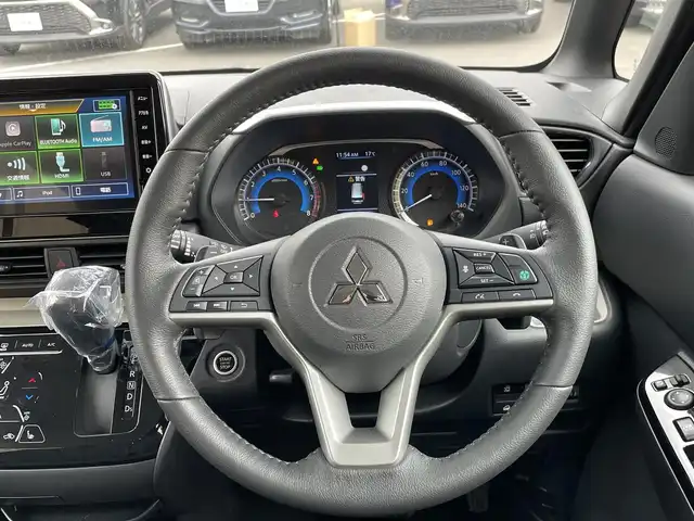 三菱 デリカミニ T プレミアム 東京都 2025(令7)年 0.1万km未満 緑 届出済未使用車/純正ディスプレイオーディオ/マルチアラウンドモニター/衝突被害軽減/車線逸脱警報/シートヒーター/両側パワースライドドア/ステアリングヒーター/ステアリングスイッチ/スマートキー