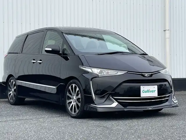 トヨタ エスティマ アエラス プレミアム G 千葉県 2019(令1)年 6.1万km ブラック モデリスタエアロ（F・S・R）/フリップダウンモニター/社外9インチナビ【MDV-M906HDl】/（CD/DVD/フルセグTV/BT）/バックカメラ/セーフティーセンス/・プリクラッシュセーフティ/・レーンディパーチャーアラート/・オートマチックハイビーム/・先行車発進お知らせ機能/ビルトインETC/両側パワースライドドア/シートヒーター（D・N席）/D席パワーシート/電動リアゲート/クルーズコントロール/ウッドコンビステアリング/ステアリングスイッチ/AC100V/LEDヘッドライト/オートライト/スマートキー/プッシュスタート/電動格納ミラー/純正フロアマット/VENERDI18インチAW/純正AW積み込みあり