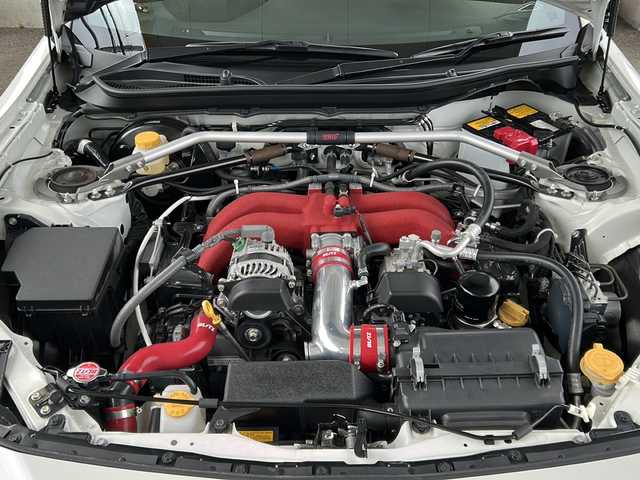 スバル ＢＲＺ STIスポーツ 東京都 2019(令1)年 1.5万km クリスタルホワイトP ワンオーナー/社外オーディオ/【CD・ラジオ】/STIスポーツパッケージ/TRDリアトランクスポイラー/TRDフェンダーエクステンション/BLITZ　ラジエーター/BLITZ　レーシングメーターパネル/【油圧・油温・水温三連メーター】/BLITZ　サクションキット/KENWOOD　カスタムフィットスピーカー/KENWOOD　チューンアップサブウーファー/HKS　メタルキャタライザー/ETC/前後ドライブレコーダー/クルーズコントロール/横滑り防止機能/前席シートヒーター/電動格納ミラー/オートライト/プッシュスタート/スマートキー/スペアキーあり/新車保証書/取扱説明書