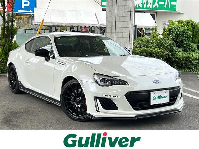 スバル ＢＲＺ STIスポーツ 東京都 2019(令1)年 1.5万km クリスタルホワイトP ワンオーナー/社外オーディオ/【CD・ラジオ】/STIスポーツパッケージ/TRDリアトランクスポイラー/TRDフェンダーエクステンション/BLITZ　ラジエーター/BLITZ　レーシングメーターパネル/【油圧・油温・水温三連メーター】/BLITZ　サクションキット/KENWOOD　カスタムフィットスピーカー/KENWOOD　チューンアップサブウーファー/HKS　メタルキャタライザー/ETC/前後ドライブレコーダー/クルーズコントロール/横滑り防止機能/前席シートヒーター/電動格納ミラー/オートライト/プッシュスタート/スマートキー/スペアキーあり/新車保証書/取扱説明書
