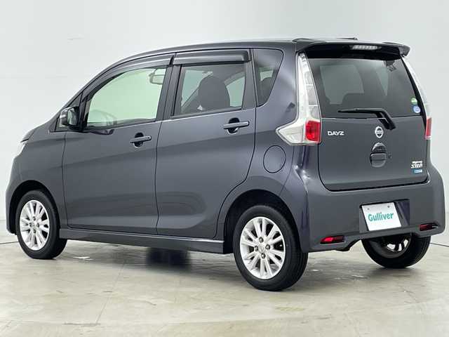 日産 デイズ ハイウェイスターX 道央・札幌 2013(平25)年 7万km プレミアムパープルP ・４WD/・純正ナビ/・フルセグTV/・バックカメラ/・モニター付自動防眩ミラー/・運転席シートヒーター/・ETC/・HIDヘッドライト/・フォグランプ/・アイドリングストップ/・プッシュスタート/・14インチ純正アルミホイール/・純正フロアマット/・純正ドアバイザー