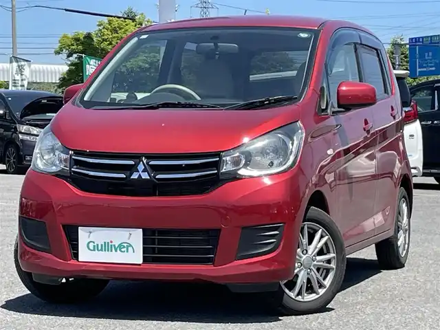 三菱 ｅＫワゴン M 道央・札幌 2017(平29)年 4.8万km レッドメタリック ４WD/社外オーディオ/AM/FM/CD/USB/AUX/横滑り防止装置/アイドリングストップ/D席シートヒーター/リモコンキー/ハロゲンヘッドライト/ヘッドライトレベライザー/電動格納ミラー/フロアマット/ドアバイザー/スペアキー