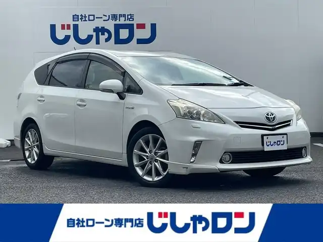 トヨタ プリウス α S ツーリングセレクション 埼玉県 2012(平24)年 14.3万km ホワイトパールクリスタルシャイン (株)IDOMが運営する【じしゃロン鳩ヶ谷店】の自社ローン専用車両になりますこちらは現金またはオートローンご利用時の価格です。自社ローンご希望の方は別途その旨お申付け下さい/純正SDナビ/（CD/DVD/Bluetooth接続）/フルセグＴＶ/バックカメラ/ビルドインETC/SRSエアバッグシステム/サイド&カーテンエアバッグ/純正フロアマット/ステアリングスイッチ/純正ドアバイザー/スマートキー/プッシュスタート/純正アルミホイール/オートライト/オートエアコン/革巻ステアリング/LEDヘッドライト