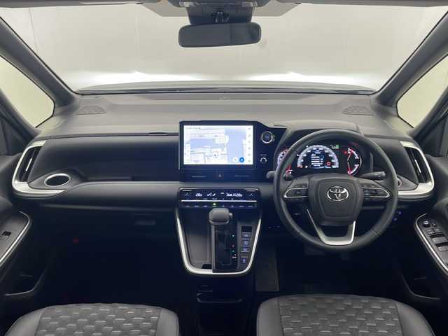 トヨタ ヴォクシー S－Z 愛知県 2023(令5)年 1.4万km アティチュードブラックマイカ 禁煙車/トヨタセーフティセンス/純正10.5型ディスプレイオーディオ/（T-CONNECT/CD/DVD/Bluetooth/フルセグTV/ナビ）/純正14型リアフリップダウンモニター/純正ビルトイン2.0ETC/純正バックカメラ/純正17インチアルミ/純正LEDオートライト/純正エアロ/純正ルーフエンドスポイラー/純正フロアマット/両側電動スライドドア/アダプティブクルーズコントロール/レーンディパーチャーアラート/オートマチックハイビーム/クリアランスソナー/ハーフレザーシート/前席シートヒーター/Wオートエアコン/スマートキー/プッシュエンジンスタート/新車時保証書/取扱い説明書