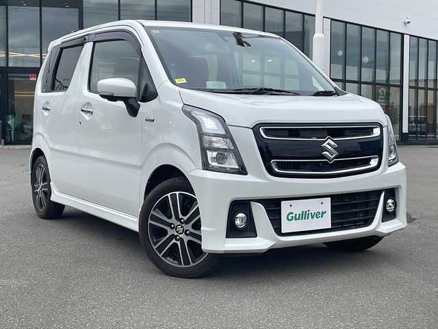 スズキ ワゴンＲ スティングレー HYBRID T 青森県 2019(平31)年 4.5万km ピュアホワイトP ・４WD/・禁煙車/・8型社外SDナビ/・フルセグ/DVD/AM/FM/・衝突被害軽減ブレーキ/・全方位カメラ/・クルーズコントロール/・横滑り防止装置/・盗難防止装置/・レーンキープアシスト/・ヘッドアップディスプレイ/・スマートキー/・スペアキー/・オートライト/・LEDライト/・フォグランプ/・ダブルエアバック/・前席シートヒーター/・ベンチシート/・フルフラットシート/・純正フロアマット/・純正アルミホイール/・純正ドライブレコーダー/・パドルシフト/・ETC/・取扱説明書