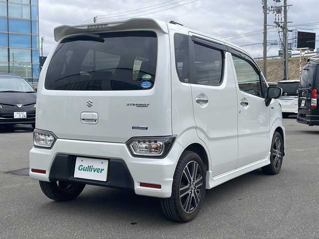 スズキ ワゴンＲ スティングレー HYBRID T 青森県 2019(平31)年 4.5万km ピュアホワイトP ・４WD/・禁煙車/・8型社外SDナビ/・フルセグ/DVD/AM/FM/・衝突被害軽減ブレーキ/・全方位カメラ/・クルーズコントロール/・横滑り防止装置/・盗難防止装置/・レーンキープアシスト/・ヘッドアップディスプレイ/・スマートキー/・スペアキー/・オートライト/・LEDライト/・フォグランプ/・ダブルエアバック/・前席シートヒーター/・ベンチシート/・フルフラットシート/・純正フロアマット/・純正アルミホイール/・純正ドライブレコーダー/・パドルシフト/・ETC/・取扱説明書