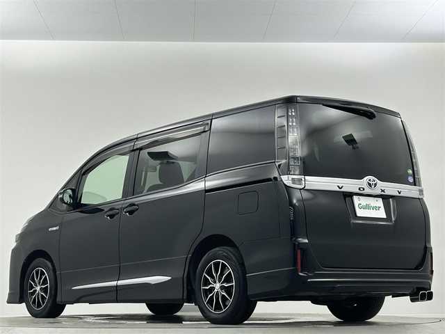 トヨタ ヴォクシー ハイブリッド X 埼玉県 2014(平26)年 13.5万km ブラック 9型ナビ　フリップダウンモニター　バックカメラ　モデリスタエアロ　パワースライドドア　ビルトインETC　ドアバイザー　フロアマット　スマートキー　ＬＥＤヘッドライト　フォグランプ