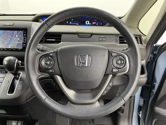 ホンダ フリード G ホンダセンシング 群馬県 2019(令1)年 4.3万km シーグラスブルーパール 純正７インチナビ　バックカメラ　両側パワースライドドア　レーダークルーズコントロール　ＬＥＤライト　シートヒーター　純正１５インチＡＷ　ステアリングリモコン　ＥＴＣ２．０　ドライブレコーダー　禁煙車
