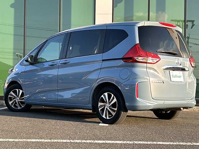 ホンダ フリード G ホンダセンシング 福岡県 2019(令1)年 4.3万km シーグラスブルーパール 純正７インチナビ　バックカメラ　両側パワースライドドア　レーダークルーズコントロール　ＬＥＤライト　シートヒーター　純正１５インチＡＷ　ステアリングリモコン　ＥＴＣ２．０　ドライブレコーダー　禁煙車