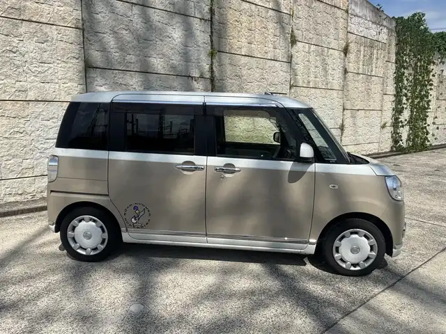 ダイハツ ムーヴ キャンバス G メイクアップ SA Ⅲ 長崎県 2018(平30)年 6万km パールホワイトⅢ/ナチュラルベージュマイカメタリック 2トーン 純正ディスプレイオーディオ/（CD/DVD/BT）/バックカメラ/衝突軽減ブレーキ/両側パワースライドドア/シートカバー/スマートキー/プッシュスタート/オートライト