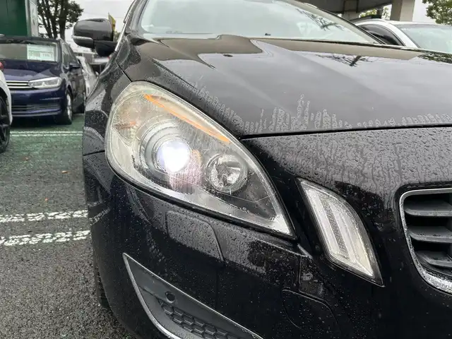 ボルボ Ｖ６０ T4 Rデザイン 宮城県 2013(平25)年 8.9万km 黒 /純正HDDナビ//CD/DVD/BT/USB/ipod/フルセグテレビ//バックカメラ//ブラウンレザーシート//前席パワーシート/シートヒーター//クルーズコントロール//ETC//HID//リモコンキーx2