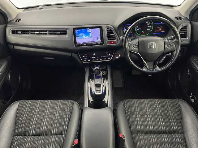 ホンダ ヴェゼル ハイブリッド Z 栃木県 2015(平27)年 9.1万km ホワイトオーキッドパール 禁煙車/衝突軽減ブレーキ/クルーズコントロール/社外メモリーナビ/・フルセグ/AM/FM/CD/DVD/BT/HDMI/バックカメラ/前側ドライブレコーダ―/ETC/前席シートヒーター/電動パーキング/LEDヘッドライト/オートライト/フォグランプ/パドルシフト/17インチ純正AW/純正フロアマット/スペアキー/取扱説明書/保証書