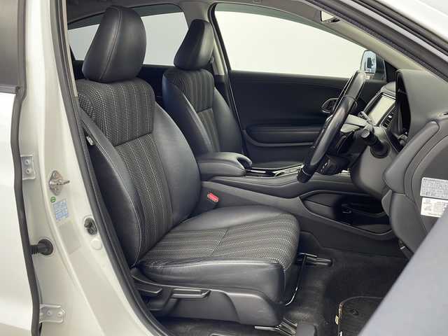 ホンダ ヴェゼル ハイブリッド Z 栃木県 2015(平27)年 9.1万km ホワイトオーキッドパール 禁煙車/衝突軽減ブレーキ/クルーズコントロール/社外メモリーナビ/・フルセグ/AM/FM/CD/DVD/BT/HDMI/バックカメラ/前側ドライブレコーダ―/ETC/前席シートヒーター/電動パーキング/LEDヘッドライト/オートライト/フォグランプ/パドルシフト/17インチ純正AW/純正フロアマット/スペアキー/取扱説明書/保証書