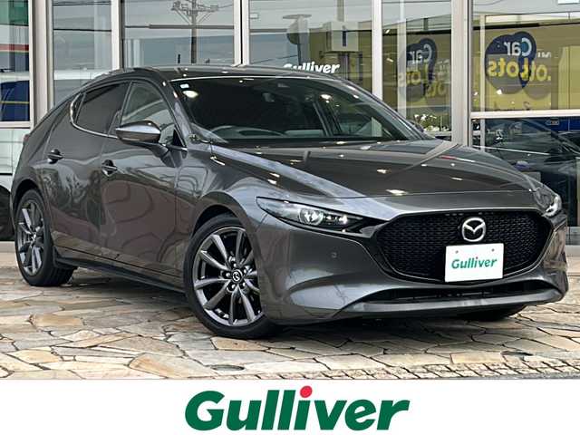 マツダ マツダ３ファストバック 20S プロアクティブ 静岡県 2020(令2)年 3.8万km マシーングレープレミアムM 純正ナビ/・FM/AM/・Bluetooth/・USB/・HDMI/主要装備/・ドライブレコーダー/・ＥＴＣ/・追従機能付クルーズコントロール/・ヘッドアップディスプレイ/・パドルシフト/・ＭＴモード付ＡＴ/・アイドリングストップ/・コーナーセンサー/・ブラインドスポットモニタリング/・レーンキープアシスト/・スマートブレーキサポート/・左右独立温度調整オートエアコン