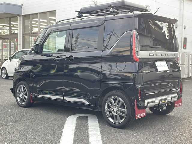 三菱 デリカミニ T プレミアム 東京都 2023(令5)年 0.9万km アメジストブラック 4WD/ターボ/禁煙車両/メモリナビ(MM222D-LM)/全方位カメラ/フルセグテレビ/マイパイロット/ルーフキャリア/ルーフボックス/両側パワースライドドア /フロントバンパーガード/マットガード/ヒッチメンバー/純正15インチAW/取説書/保証書