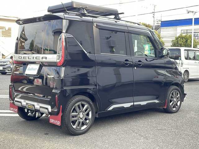 三菱 デリカミニ T プレミアム 東京都 2023(令5)年 0.9万km アメジストブラック 4WD/ターボ/禁煙車両/メモリナビ(MM222D-LM)/全方位カメラ/フルセグテレビ/マイパイロット/ルーフキャリア/ルーフボックス/両側パワースライドドア /フロントバンパーガード/マットガード/ヒッチメンバー/純正15インチAW/取説書/保証書