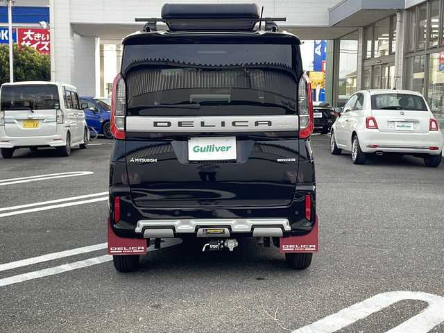 三菱 デリカミニ T プレミアム 東京都 2023(令5)年 0.9万km アメジストブラック 4WD/ターボ/禁煙車両/メモリナビ(MM222D-LM)/全方位カメラ/フルセグテレビ/マイパイロット/ルーフキャリア/ルーフボックス/両側パワースライドドア /フロントバンパーガード/マットガード/ヒッチメンバー/純正15インチAW/取説書/保証書