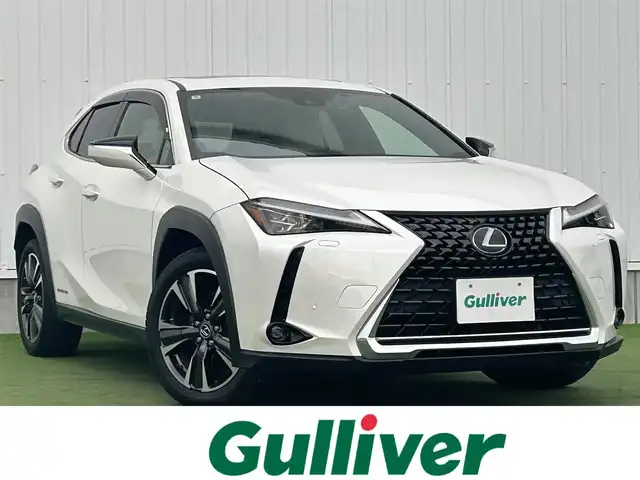 レクサス ＵＸ 250h バージョンL 香川県 2020(令2)年 3.9万km ソニッククォーツ 登録時走行距離38821km/サンルーフ/純正10.3型SDナビ/（Bluetooth/DVD/USB/AUX/MSV）/フルセグTV（走行中視聴可能）/バックカメラ/前後ドライブレコーダー【ZDR-035】/Lexus Safety System +/・プリクラッシュセーフティ/・レーンディパーチャーアラート＆キーピングシステム/・オートマチック＆アダプティブハイビームシステム/・アダプティブクルーズコントロール/・ロードサインアシスト/ブラインドスポットモニター/クリアランスソナー/パワーバックドア/白革シート/前席ベンチレーション（ヒーター/クーラー）/前席パワーシート/運転席メモリー機能/革巻きステアリング/ステアリングヒーター/ステアリングスイッチ/3眼LEDヘッドライト/LEDフォグライト/ヘッドライトウォッシャー/電動パーキングブレーキ/オートブレーキホールド/レーダー探知機【ALPHA-D1V】/純正ビルトインETC2.0/純正18インチアルミホール/純正トノカバー/フロアマット/ドアバイザー/オート開閉機能付電動格納ミラー/ISOFIX