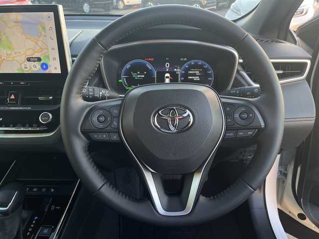 トヨタ カローラ クロス ハイブリッド Z 宮崎県 2025(令7)年 1.5万km プラチナホワイトパールマイカ パノラマルーフ/純正ディスプレイオーディオ/全方位カメラ/トヨタセーフティセンス/トヨタチームメイト/パワーバックドア/ステアリングヒーター/ハーフレザーシート/ETC/フルセグテレビ/シートヒーター/ベンチレーション/パワーシート/レーダークルーズコントロール/フロアマット