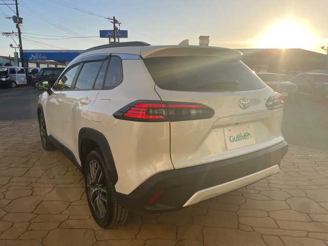 トヨタ カローラ クロス ハイブリッド Z 宮崎県 2025(令7)年 1.5万km プラチナホワイトパールマイカ パノラマルーフ/純正ディスプレイオーディオ/全方位カメラ/トヨタセーフティセンス/トヨタチームメイト/パワーバックドア/ステアリングヒーター/ハーフレザーシート/ETC/フルセグテレビ/シートヒーター/ベンチレーション/パワーシート/レーダークルーズコントロール/フロアマット