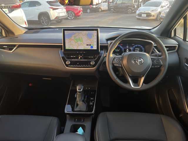 トヨタ カローラ クロス ハイブリッド Z 宮崎県 2025(令7)年 1.5万km プラチナホワイトパールマイカ パノラマルーフ/純正ディスプレイオーディオ/全方位カメラ/トヨタセーフティセンス/トヨタチームメイト/パワーバックドア/ステアリングヒーター/ハーフレザーシート/ETC/フルセグテレビ/シートヒーター/ベンチレーション/パワーシート/レーダークルーズコントロール/フロアマット