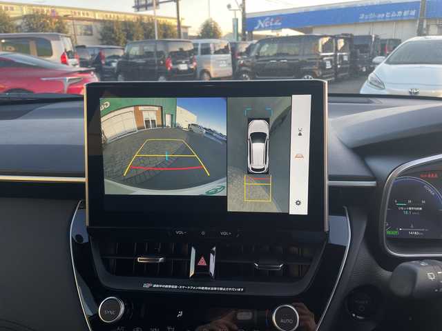 トヨタ カローラ クロス ハイブリッド Z 宮崎県 2025(令7)年 1.5万km プラチナホワイトパールマイカ パノラマルーフ/純正ディスプレイオーディオ/全方位カメラ/トヨタセーフティセンス/トヨタチームメイト/パワーバックドア/ステアリングヒーター/ハーフレザーシート/ETC/フルセグテレビ/シートヒーター/ベンチレーション/パワーシート/レーダークルーズコントロール/フロアマット