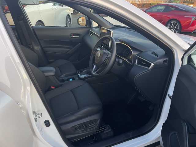 トヨタ カローラ クロス ハイブリッド Z 宮崎県 2025(令7)年 1.5万km プラチナホワイトパールマイカ パノラマルーフ/純正ディスプレイオーディオ/全方位カメラ/トヨタセーフティセンス/トヨタチームメイト/パワーバックドア/ステアリングヒーター/ハーフレザーシート/ETC/フルセグテレビ/シートヒーター/ベンチレーション/パワーシート/レーダークルーズコントロール/フロアマット