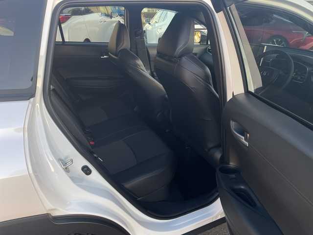 トヨタ カローラ クロス ハイブリッド Z 宮崎県 2025(令7)年 1.5万km プラチナホワイトパールマイカ パノラマルーフ/純正ディスプレイオーディオ/全方位カメラ/トヨタセーフティセンス/トヨタチームメイト/パワーバックドア/ステアリングヒーター/ハーフレザーシート/ETC/フルセグテレビ/シートヒーター/ベンチレーション/パワーシート/レーダークルーズコントロール/フロアマット