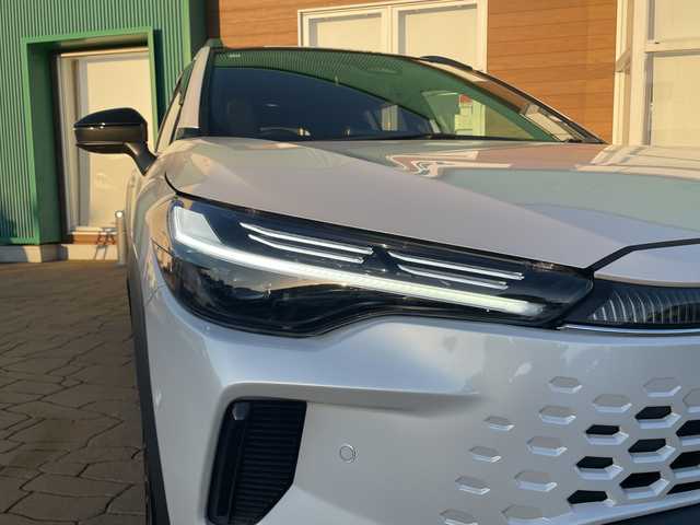 トヨタ カローラ クロス ハイブリッド Z 宮崎県 2025(令7)年 1.5万km プラチナホワイトパールマイカ パノラマルーフ/純正ディスプレイオーディオ/全方位カメラ/トヨタセーフティセンス/トヨタチームメイト/パワーバックドア/ステアリングヒーター/ハーフレザーシート/ETC/フルセグテレビ/シートヒーター/ベンチレーション/パワーシート/レーダークルーズコントロール/フロアマット