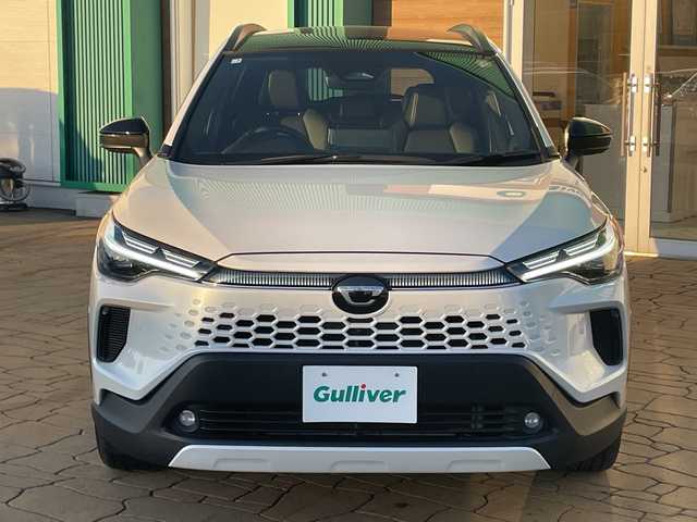 トヨタ カローラ クロス ハイブリッド Z 宮崎県 2025(令7)年 1.5万km プラチナホワイトパールマイカ パノラマルーフ/純正ディスプレイオーディオ/全方位カメラ/トヨタセーフティセンス/トヨタチームメイト/パワーバックドア/ステアリングヒーター/ハーフレザーシート/ETC/フルセグテレビ/シートヒーター/ベンチレーション/パワーシート/レーダークルーズコントロール/フロアマット