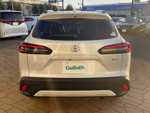 トヨタ カローラ クロス ハイブリッド Z 宮崎県 2025(令7)年 1.5万km プラチナホワイトパールマイカ パノラマルーフ/純正ディスプレイオーディオ/全方位カメラ/トヨタセーフティセンス/トヨタチームメイト/パワーバックドア/ステアリングヒーター/ハーフレザーシート/ETC/フルセグテレビ/シートヒーター/ベンチレーション/パワーシート/レーダークルーズコントロール/フロアマット