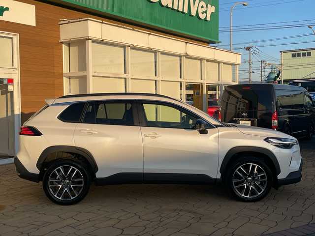 トヨタ カローラ クロス ハイブリッド Z 宮崎県 2025(令7)年 1.5万km プラチナホワイトパールマイカ パノラマルーフ/純正ディスプレイオーディオ/全方位カメラ/トヨタセーフティセンス/トヨタチームメイト/パワーバックドア/ステアリングヒーター/ハーフレザーシート/ETC/フルセグテレビ/シートヒーター/ベンチレーション/パワーシート/レーダークルーズコントロール/フロアマット