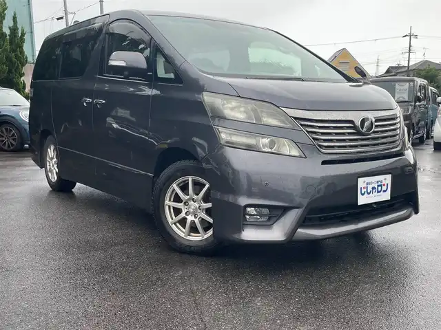 トヨタ ヴェルファイア 2．4Z プラチナセレクションⅡ 和歌山県 2010(平22)年 10.1万km グレーメタリック (株)IDOMが運営する【じしゃロン和歌山店】の自社ローン専用車両になります。こちらは現金またはオートローンご利用時の価格です。自社ローンご希望の方は別途その旨お申付け下さい/社外ナビ/両側パワースライドドア/純正フリップダウンモニター /スマートキー/バックカメラ/MTモード付きAT/オートライト/電動リアゲート/前後コーナーセンサー