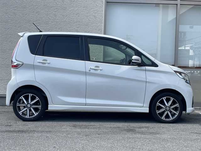 日産 デイズ ハイウェイスターG ターボ 大阪府 2016(平28)年 15万km ホワイトパール 純正7インチナビ/（フルセグ／ＢＴ／ＣＤ／ＤＶＤ）/全方位モニター/衝突被害軽減システム/盗難防止装置/横滑り防止装置/アイドリングストップ/オートマチックハイビーム/前方ドライブレコーダー/ETC/純正15インチAW/保証書/取扱説明書