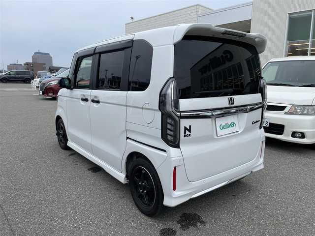 ホンダ Ｎ ＢＯＸ カスタム L 石川県 2023(令5)年 1.4万km プラチナホワイトパール ワンオーナー/純正8型ナビ/CD/DVD/フルセグTV/バックカメラ/両側パワースライドドア/LEDヘッドライト/ETC/シートヒーター/ドライブレコーダー/ホンダセンシング/レーダークルーズ/社外アルミホイール/無限スポイラー/保証書