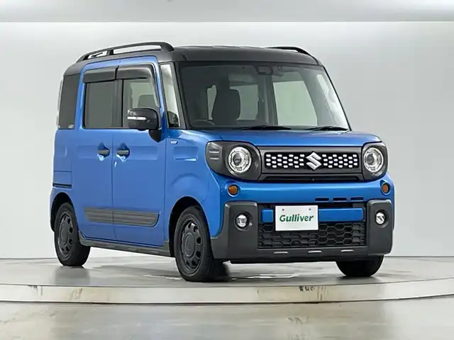 スズキ スペーシア ギア HYBRID XZターボ 愛知県 2019(令1)年 5.1万km ブリスクブルーメタリック/ガンメタリック2トーンルーフ 禁煙車/ターボ/純正8インチナビ/（CD/DVD/Bluetooth/フルセグTV/USB)/全方位カメラ/セーフティサポート/・デュアルセンサーブレーキサポート/・車線逸脱警報機能/・先行車発進お知らせ機能/・後退時ブレーキサポート/・リアパーキングセンサー/・前後誤発進抑制機能/・ふらつき警報機能/・ハイビームアシスト/ヘッドアップディスプレイ/クルーズコントロール/ドライブレコーダー/ETC/シートヒーター/パドルシフト/両側パワースライドドア/アイドリングストップ/ルーフレール/LEDヘッドライト/フロントフォグランプ/純正フロアマット/スマートキー/プッシュスタート/横滑り防止装置/電動格納ミラー/