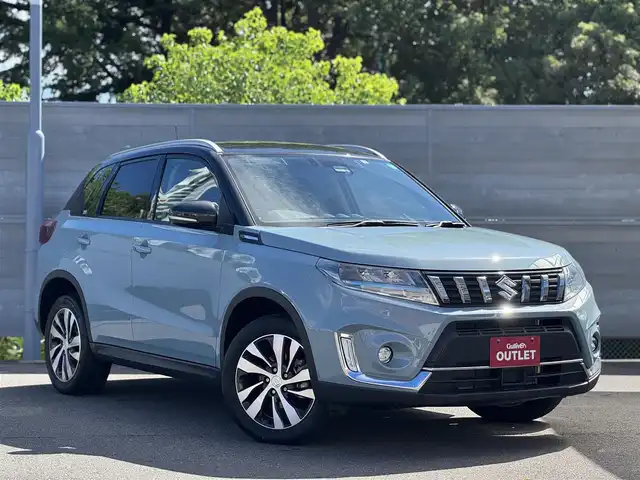 スズキ エスクード 三重県 2022(令4)年 0.6万km アイスグレーイッシュブルーメタリック/ブラック 2トーンルーフ ブラック2トーンルーフ/ブラックドアミラー/セーフティサポート/アイドリングストップ/純正8インチメモリナビ・地デジTV/・DVD/CD/・Bluetooth/レーダークルーズコントロール/車線逸脱警報機能/ブラインドスポットモニター/ホワイトステッチ入革/幾何学調エンボス入スエード調コンビシート/前席シートヒーター/純正17インチ5本ツインスポークアルミホイール/ルーフレール/ブルー加飾付LEDヘッドランプ/・オートライト/オートマチックハイビーム/LEDフロントフォグランプ/プッシュエンジンスタート/スマートキー×2