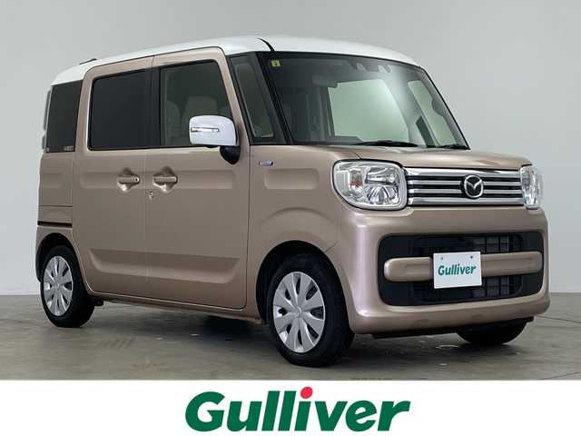 マツダ フレアワゴン ハイブリッド XS 鹿児島県 2023(令5)年 2.6万km ピンク ワンオーナー     /新車保証書・取扱説明書/スマートキー×2/メーカーOP：40.000円/ホワイトルーフ・ホワイトドアミラー/セーフティサポート（予備安全技術）/：デュアルカメラブレーキサポート/：アダプティブクルーズコントロール/：誤発進抑制機能：車線逸脱警報機能/：車線逸脱抑制機能：先行車発信おしらせ機能/：ふらつき警報機能：発進お知らせ機能/：ハイビームアシスト：リアパーキングセンサー/メーカーOP：50.000円/全方位モニター用カメラパッケージ/：フロント・サイド・バックカメラ/：ステアリングスイッチ/メーカーOP：75.000円/アップグレードパッケージ/フルLEDヘッドライト・LEDポジションランプ/ウィンカーミラー/パワースライドドア（運転席・助手席）/シートヒーター（運転席）/：パーソナルテーブル（運転席）/：オートエアコン/：エコクール/：スリムサーキュレーター