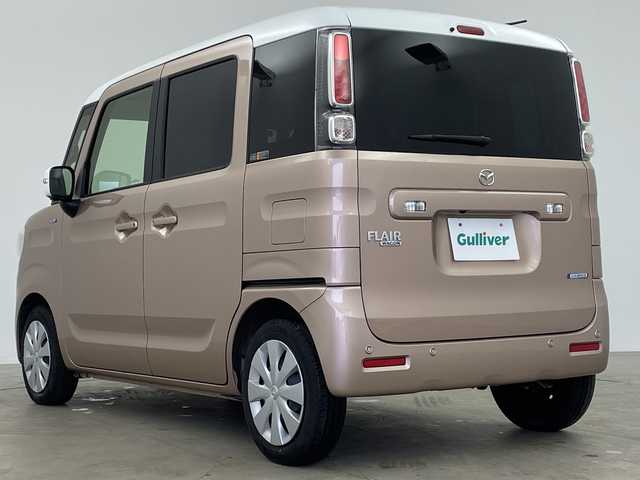 マツダ フレアワゴン ハイブリッド XS 鹿児島県 2023(令5)年 2.6万km ピンク ワンオーナー     /新車保証書・取扱説明書/スマートキー×2/メーカーOP：40.000円/ホワイトルーフ・ホワイトドアミラー/セーフティサポート（予備安全技術）/：デュアルカメラブレーキサポート/：アダプティブクルーズコントロール/：誤発進抑制機能：車線逸脱警報機能/：車線逸脱抑制機能：先行車発信おしらせ機能/：ふらつき警報機能：発進お知らせ機能/：ハイビームアシスト：リアパーキングセンサー/メーカーOP：50.000円/全方位モニター用カメラパッケージ/：フロント・サイド・バックカメラ/：ステアリングスイッチ/メーカーOP：75.000円/アップグレードパッケージ/フルLEDヘッドライト・LEDポジションランプ/ウィンカーミラー/パワースライドドア（運転席・助手席）/シートヒーター（運転席）/：パーソナルテーブル（運転席）/：オートエアコン/：エコクール/：スリムサーキュレーター